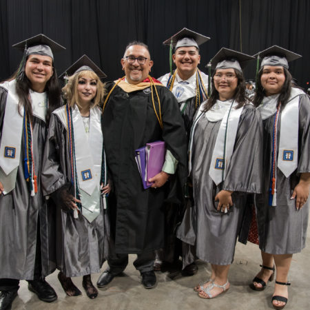 Theater Students pose with their teacher Jose DeHoyos